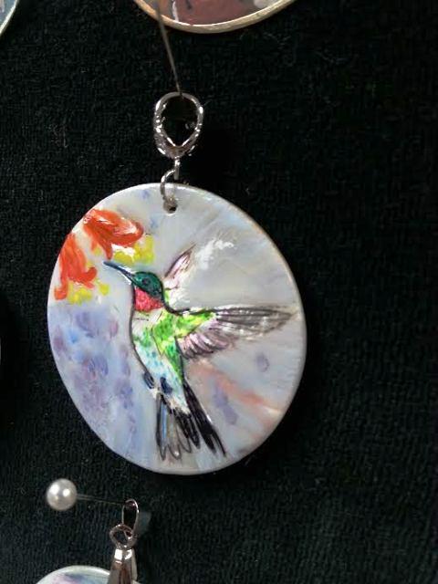 hummingbird pendant on shell