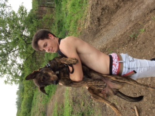 Max with my brother. In this picture you can tell what size he is